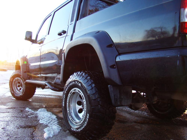 Расширители колёсных арок УАЗ Патриот пикап (с накладками на передний бампера) Расширители колёсных арок УАЗ Патриот пикап (с накладками на передний бампера)